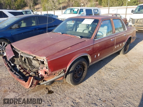 1990 Oldsmobile Cutlass Ciera with VIN 2G3AM54N7L2303078, listed as a IAAI auction lot 41882943 with 190,496 mi miles and . Bid and sale history available at DreamBid. Image 2.
