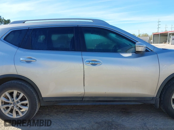 2017 Nissan Rogue SL with VIN 5N1AT2MT0HC826302, listed as a IAAI auction lot 41801657 with 111,216 mi miles and . Bid and sale history available at DreamBid. Image 14.