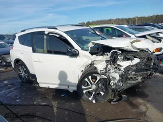 2017 Toyota RAV4 LE with VIN JTMZFREV8HJ721753, listed as a IAAI auction lot 41286036 with 119,246 mi miles. Bid and sale history available at carsss.com. Image 14.