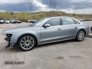 2013 Audi A8 3.0L z VIN WAURGAFD2DN026253, wystawiony jako Copart lot #55476795 z przebiegiem 133 083 mil mil oraz Szkoda całkowita • Salvage title. Historia ofert i sprzedaży dostępna na DreamBid. Obrazek 1.