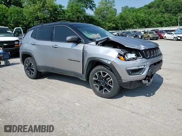 2019 Jeep Compass Trailhawk z VIN 3C4NJDDB2KT667874, wystawiony jako Copart lot #60784475 z przebiegiem 82 426 mil mil oraz Szkoda całkowita • Salvage title. Historia ofert i sprzedaży dostępna na DreamBid. Obrazek 14.