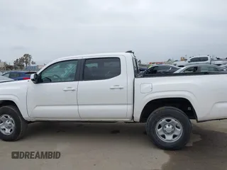 2021 Toyota Tacoma SR with VIN 3TYAX5GNXMT032184, listed as a IAAI auction lot 42204429 with 60,295 mi miles and . Bid and sale history available at DreamBid. Image 14.
