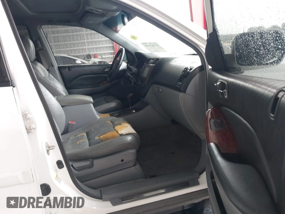 2004 Acura MDX with VIN 2HNYD18274H535096, listed as a IAAI auction lot 41365199 with 231,438 mi miles. Bid and sale history available at carsss.com. Image 5.