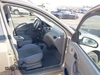 2004 Ford Focus SE with VIN 1FAFP34354W167961, listed as a IAAI auction lot 41545304 with 128,560 mi miles and . Bid and sale history available at DreamBid. Image 5.
