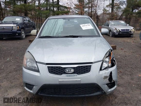 2010 Kia Rio LX with VIN KNADH4A37A6645279, listed as a IAAI auction lot 40856780 with 165,385 mi miles. Bid and sale history available at carsss.com. Image 12.