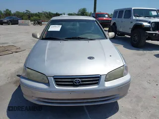 2000 Toyota Camry CE z VIN 4T1BG22K5YU972322, wystawiony jako IAAI lot #42098429 z przebiegiem 122 351 mil mil oraz . Historia ofert i sprzedaży dostępna na DreamBid. Obrazek 12.