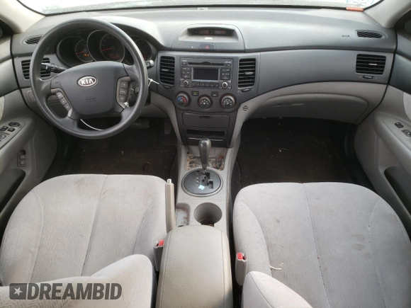 2009 Kia Optima LX z VIN KNAGE228695331919, wystawiony jako Copart lot #57804835 z przebiegiem 199 204 mil mil oraz Szkoda całkowita • Salvage title. Historia ofert i sprzedaży dostępna na DreamBid. Obrazek 8.