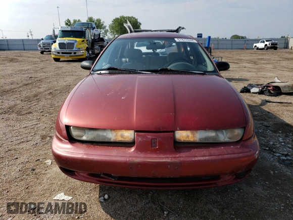 1999 Saturn SW z VIN 1G8ZK827XXZ348270, wystawiony jako Copart lot #67872244 z przebiegiem 110 936 mil mil oraz Szkody całkowita. Historia ofert i sprzedaży dostępna na DreamBid. Obrazek 5.