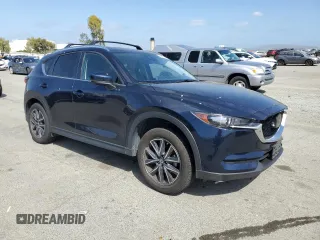 2018 Mazda CX-5 Touring with VIN JM3KFACM6J1323449, listed as a Copart auction lot 54090445 with 93,748 mi miles and Salvage Title. Bid and sale history available at carsss.com. Image 4.