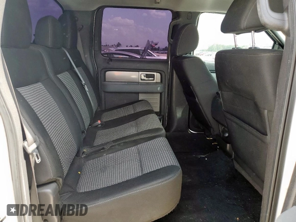2011 Ford F-150 XL with VIN 1FTEW1CM9BKD99944, listed as a Copart auction lot 64069465 with 288,402 mi miles and Salvage title. Bid and sale history available at DreamBid. Image 10.