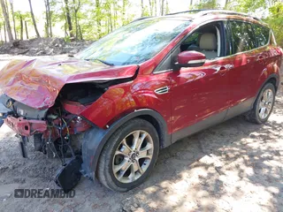 2014 Ford Escape Titanium with VIN 1FMCU9JX7EUB68165, listed as a IAAI auction lot 42141235 with 172,041 mi miles and . Bid and sale history available at DreamBid. Image 18.