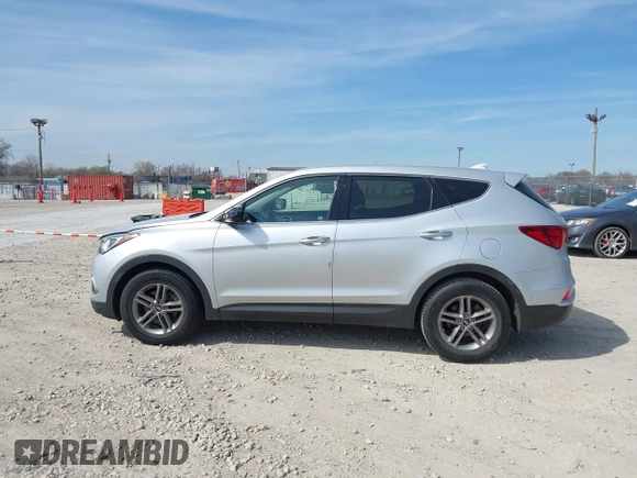 2017 Hyundai Santa Fe 2.4L z VIN 5XYZTDLB8HG465425, wystawiony jako IAAI lot #42041881 z przebiegiem 103 161 mil mil oraz . Historia ofert i sprzedaży dostępna na DreamBid. Obrazek 14.