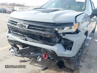 2024 Chevrolet Silverado 1500 LT Trail Boss with VIN 3GCUDFE83RG314063, listed as a IAAI auction lot 41824385 with 14,164 mi miles and . Bid and sale history available at DreamBid. Image 6.