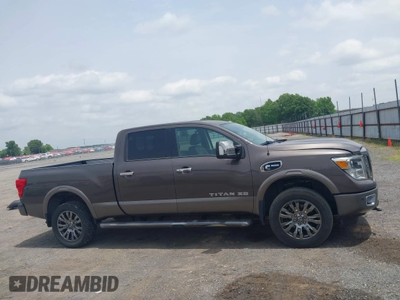 2016 Nissan Titan SL z VIN 1N6BA1F48GN510113, wystawiony jako IAAI lot #42252271 z przebiegiem 58 691 mil mil oraz . Historia ofert i sprzedaży dostępna na DreamBid. Obrazek 13.