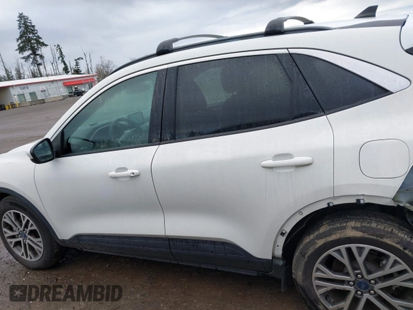 2021 Ford Escape SEL with VIN 1FMCU9H91MUB35409, listed as a IAAI auction lot 41900711 with 19,295 mi miles and . Bid and sale history available at DreamBid. Image 15.