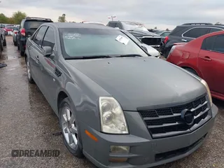 2008 Cadillac STS RWD z VIN 1G6DW67V380125903, wystawiony jako IAAI lot #40895449 z przebiegiem 102 873 mil mil oraz . Historia ofert i sprzedaży dostępna na DreamBid. Obrazek 1.