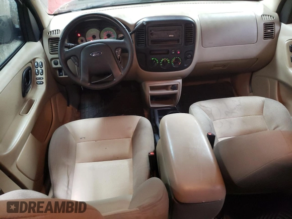 2004 Ford Escape XLS with VIN 1FMYU021X4DA05312, listed as a Copart auction lot 86185954 with 186,010 mi miles and Salvage Title. Bid and sale history available at DreamBid. Image 8.