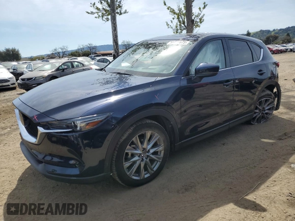 2021 Mazda CX-5 Grand Touring with VIN JM3KFBDM2M0494679, listed as a Copart auction lot 50017675 with 25,965 mi miles and Salvage Title. Bid and sale history available at carsss.com. Image 1.