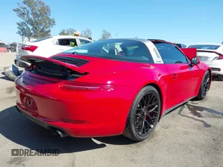 2016 Porsche 911 4S z VIN WP0BB2A99GS136573, wystawiony jako IAAI lot #42238845 z przebiegiem 13 464 mil mil oraz . Historia ofert i sprzedaży dostępna na DreamBid. Obrazek 4.