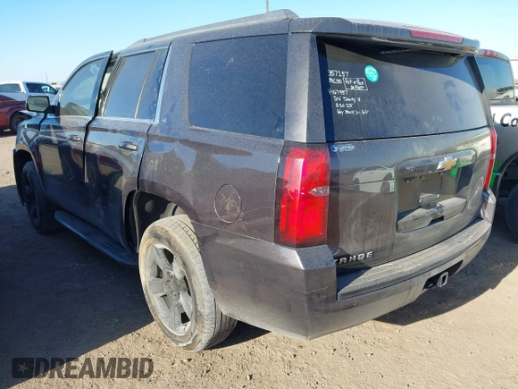 2015 Chevrolet Tahoe LT with VIN 1GNSCBKC0FR167957, listed as a IAAI auction lot 41526568 with Not provided miles and . Bid and sale history available at DreamBid. Image 3.