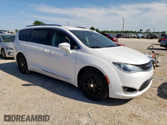 2020 Chrysler Pacifica Touring L with VIN 2C4RC1BG7LR125649, listed as a Copart auction lot 57873365 with 117,114 mi miles and Salvage title. Bid and sale history available at DreamBid. Image 4.
