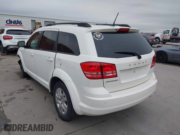 2020 Dodge Journey SE Value with VIN 3C4PDCAB4LT254595, listed as a IAAI auction lot 41572159 with 124,804 mi miles and . Bid and sale history available at carsss.com. Image 3.
