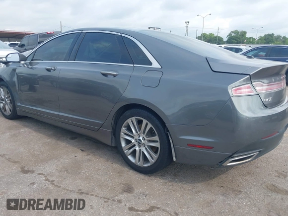 2014 Lincoln MKZ z VIN 3LN6L2GK3ER807586, wystawiony jako IAAI lot #42426125 z przebiegiem 198 281 mil mil oraz . Historia ofert i sprzedaży dostępna na DreamBid. Obrazek 3.