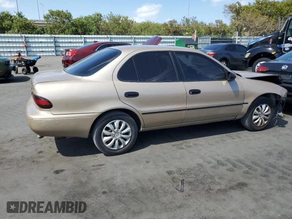 1997 Geo Prizm LSi z VIN 1Y1SK5263VZ408119, wystawiony jako Copart lot #52308235 z przebiegiem 344 971 mil mil oraz Szkody całkowita. Historia ofert i sprzedaży dostępna na DreamBid. Obrazek 3.