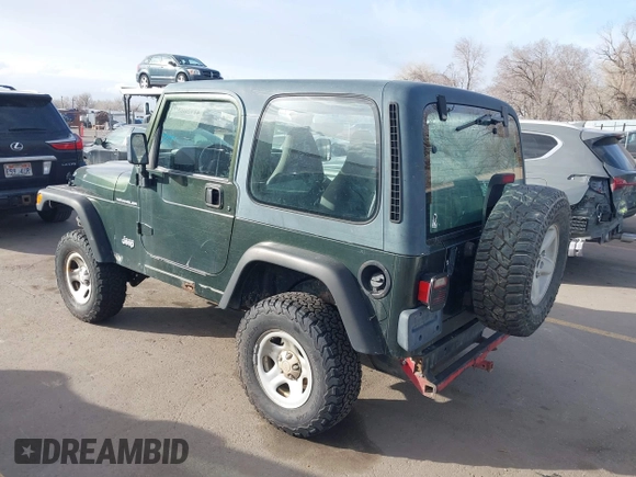 1998 Jeep Wrangler SE with VIN 1J4FY29P1WP760687, listed as a IAAI auction lot 41720889 with 210,592 mi miles. Bid and sale history available at carsss.com. Image 3.
