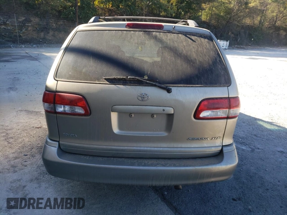 2001 Toyota Sienna LE with VIN 4T3ZF13C11U390198, listed as a Copart auction lot 76785094 with 200,803 mi miles and Salvage Title. Bid and sale history available at carsss.com. Image 6.