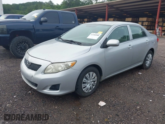 2010 Toyota Corolla with VIN 2T1BU4EE4AC512103, listed as a IAAI auction lot 42184988 with 142,954 mi miles and . Bid and sale history available at DreamBid. Image 2.