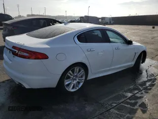 2013 Jaguar XF with VIN SAJWA8JC7DMS77243, listed as a Copart auction lot 77583544 with Not Provided miles and Salvage Title. Bid and sale history available at DreamBid. Image 3.