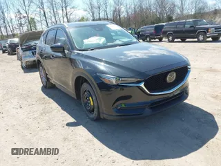 2019 Mazda CX-5 Grand Touring with VIN JM3KFADM2K1662337, listed as a IAAI auction lot 41878615 with 48,920 mi miles. Bid and sale history available at carsss.com. Image 1.