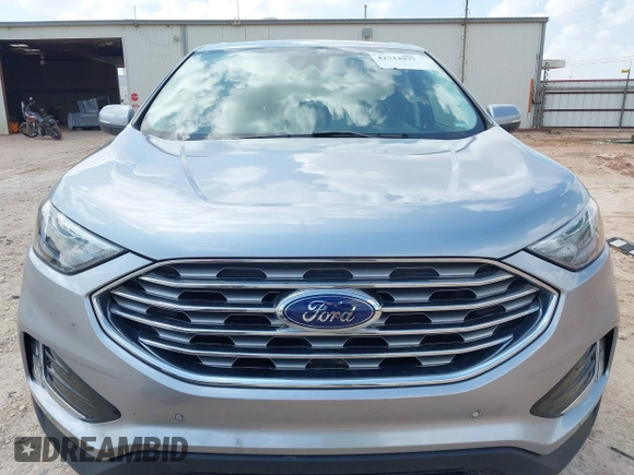 2022 Ford Edge Titanium with VIN 2FMPK4K99NBB06136, listed as a IAAI auction lot 42733977 with 57,794 mi miles and . Bid and sale history available at DreamBid. Image 12.