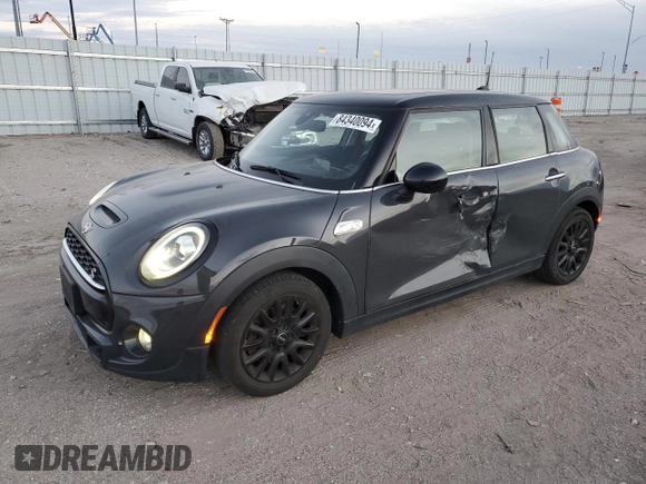 2019 MINI Hardtop 4 Door Cooper S z VIN WMWXU3C56K2H86633, wystawiony jako Copart lot #84340094 z przebiegiem 67 712 mil mil oraz Szkoda całkowita • Salvage title. Historia ofert i sprzedaży dostępna na DreamBid. Obrazek 1.
