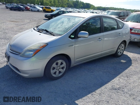 2007 Toyota Prius with VIN JTDKB20U777634652, listed as a IAAI auction lot 42182657 with 200,657 mi miles and . Bid and sale history available at DreamBid. Image 2.