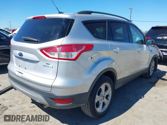 2016 Ford Escape SE with VIN 1FMCU0G96GUA99637, listed as a IAAI auction lot 41851586 with 61,143 mi miles. Bid and sale history available at carsss.com. Image 4.