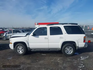 2005 Chevrolet Tahoe Z71 with VIN 1GNEK13T55R268077, listed as a IAAI auction lot 41442024 with 205,176 mi miles. Bid and sale history available at carsss.com. Image 14.
