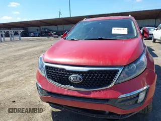 2014 Kia Sportage EX with VIN KNDPC3AC7E7630399, listed as a IAAI auction lot 42005294 with 73,975 mi miles and . Bid and sale history available at DreamBid. Image 6.