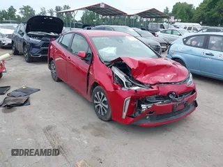 2022 Toyota Prius LE with VIN JTDL9MFU9N3034304, listed as a IAAI auction lot 42427628 with 144,642 mi miles and . Bid and sale history available at DreamBid. Image 1.