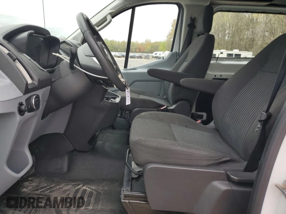 2017 Ford Transit z VIN 1FTYR1YM8HKA78211, wystawiony jako Copart lot #53779825 z przebiegiem 16 834 mil mil oraz Szkoda całkowita • Salvage title. Historia ofert i sprzedaży dostępna na DreamBid. Obrazek 7.