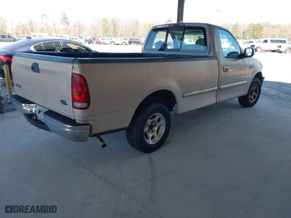 1998 Ford F-150 Standard with VIN 1FTZF1768WNA89026, listed as a IAAI auction lot 41673720 with 140,505 mi miles. Bid and sale history available at carsss.com. Image 4.