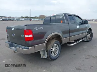 2005 Ford F-150 XLT with VIN 1FTPX14515NA43732, listed as a IAAI auction lot 41901453 with 216,729 mi miles. Bid and sale history available at carsss.com. Image 4.