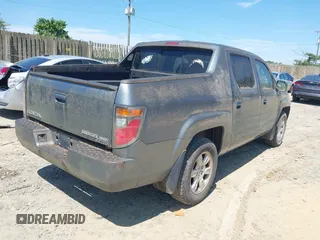 2007 Honda Ridgeline RTL z VIN 2HJYK16527H541865, wystawiony jako IAAI lot #42550602 z przebiegiem 160 703 mil mil oraz . Historia ofert i sprzedaży dostępna na DreamBid. Obrazek 4.