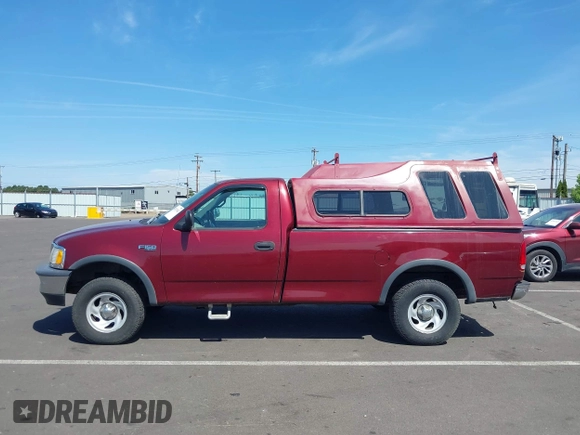 1998 Ford F-150 with VIN 1FTZF182XWKA36602, listed as a IAAI auction lot 42472442 with 112,235 mi miles and . Bid and sale history available at DreamBid. Image 14.