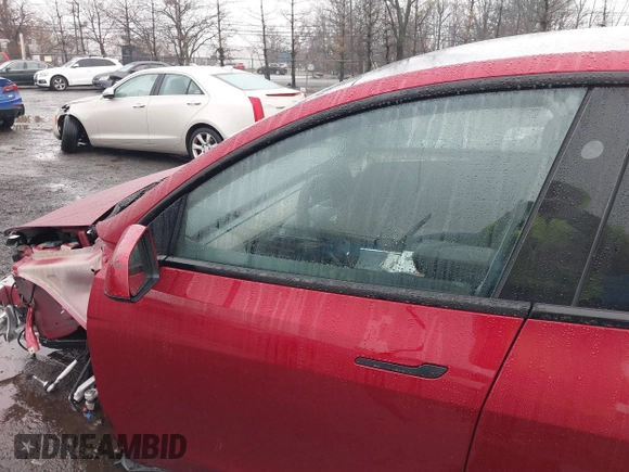2024 Tesla Model Y Long Range with VIN 7SAYGAEE7RF133073, listed as a IAAI auction lot 41081463 with Not Provided miles and . Bid and sale history available at DreamBid. Image 14.