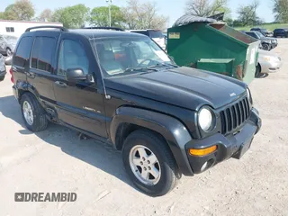 2003 Jeep Liberty Limited z VIN 1J4GL58K43W621052, wystawiony jako IAAI lot #42221352 z przebiegiem 156 836 mil mil oraz . Historia ofert i sprzedaży dostępna na DreamBid. Obrazek 1.