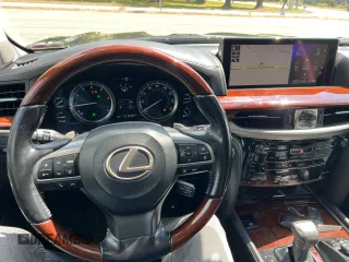 2018 Lexus LX 570 with VIN JTJHY7AX8J4258452, listed as a Copart auction lot 57357365 with 131,556 mi miles and Clean title. Bid and sale history available at DreamBid. Image 7.
