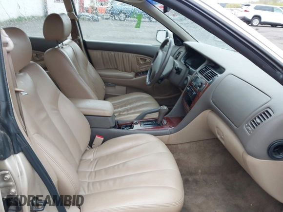 2000 Mitsubishi Diamante LS z VIN 6MMAP67P7YT005234, wystawiony jako IAAI lot #41896098 z przebiegiem 131 852 mil mil oraz . Historia ofert i sprzedaży dostępna na DreamBid. Obrazek 5.
