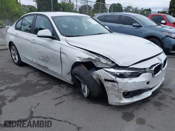 2015 BMW 3 Series 320i with VIN WBA3B1C5XFK137171, listed as a IAAI auction lot 41736278 with 28,673 mi miles. Bid and sale history available at carsss.com. Image 1.